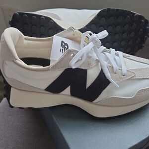 New Balance White and Black Sneakers